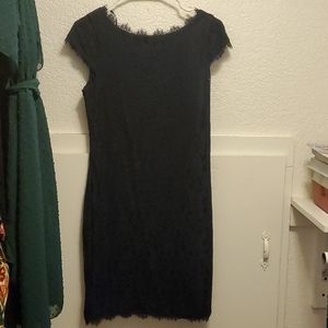 Navy blue lace dress with cap sleeves.  Size 6.